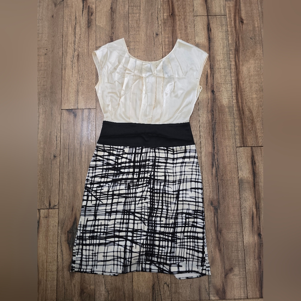 Elegant Black and Cream BCBG Dress